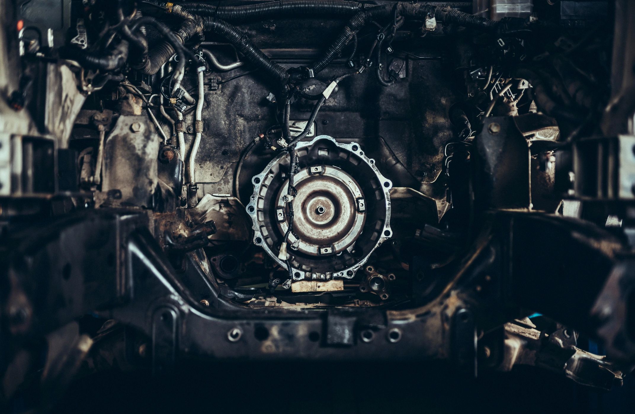 Close-up of industrial gearbox components in a workshop setting