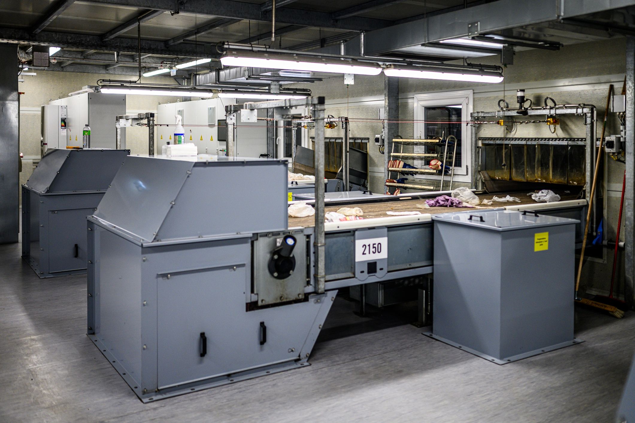 Industrial repair facility workshop with heavy equipment and tools